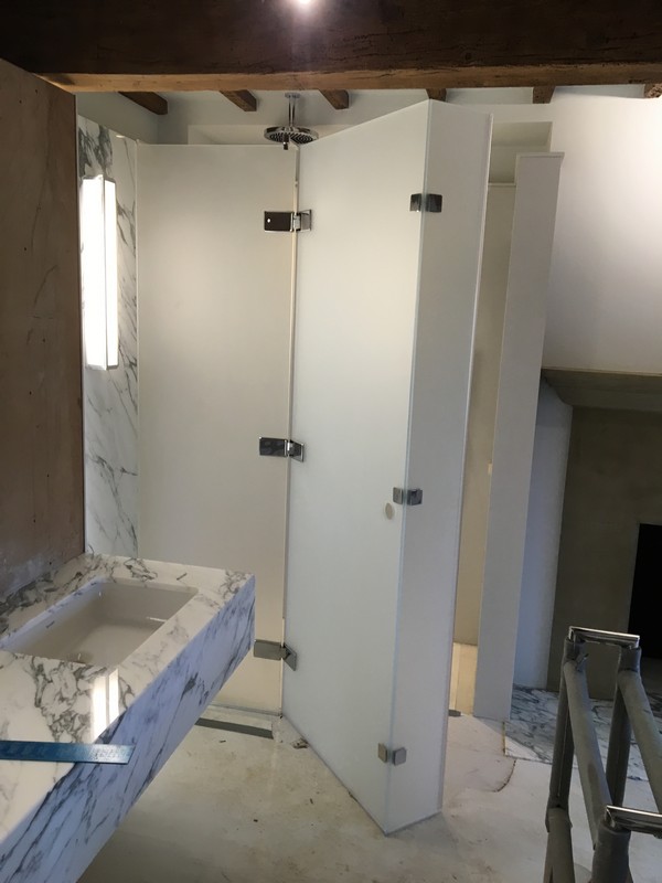 Bespoke frosted glass shower enclosure in Leytonstone luxury bathroom
