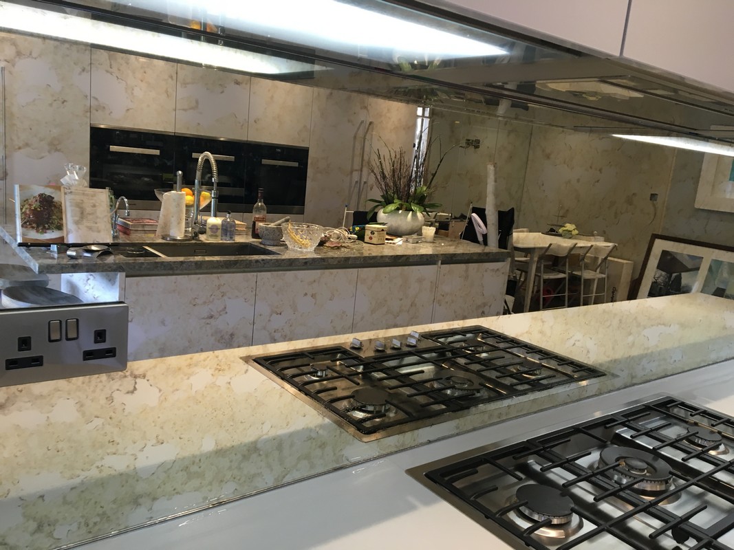 Mirror glass splashback in Leytonstone luxury kitchen